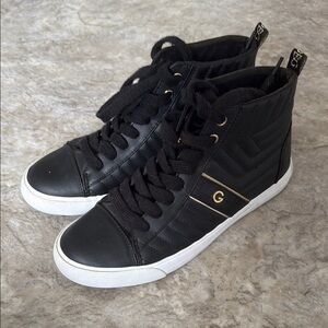 Black High-Top Sneakers with Gold Accents